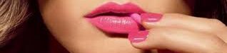 beauty products image of pink lips and matching nail polish