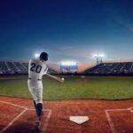 all things sports an image of a baseball player swinging the bat at a night game