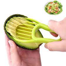 kitchen gadgets image of using an avocado cutter