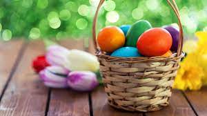 holidays an image of a basket full of colorful eggs and flowers on the side